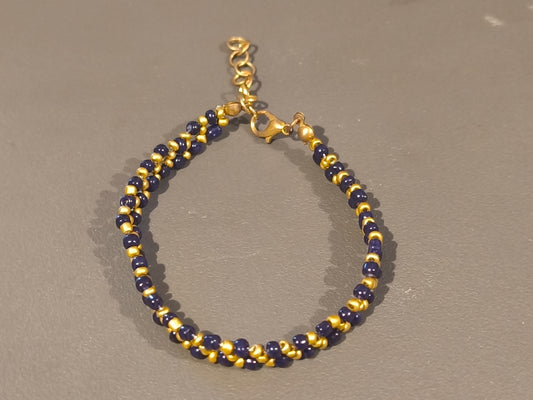 Bracelet bleu foncé et doré